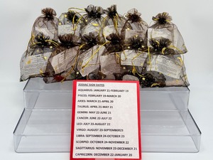 lot 219 image: 12 Zodiac Organza Bags with 4-5 stones representing the Horoscope Signs