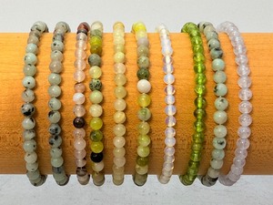 lot 164 image: Gemstone 4mm Beaded Bracelet Lot of 10 3 Kiwi Jasper, 2 Jade, 1 Peridot, 1 Blue Lace Agate, 1 Opalite, 1 Afgan Jade, & 1 Black and White Agate