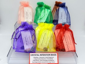 lot 301 image: Crystal Gemstone Intention Bags Lot of 12 1-stability, 1-harmony, 2-joy & happiness, 2-opportunity & success, 2-friendship, 2-abundance, and 2-courage & confidence. Each bag contains the stones of the bags intention