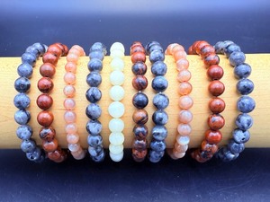 lot 146 image: Gemstone Bead Bracelets lot of 10, 6 mm and 8 mm   4-Larvakite 8mm, 3 mahogany obsidian 8mm, 1 agate 8mm and 2 sunstone 6mm