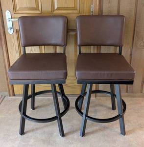 lot 62A image: ML - Pair of Brown Swivel Bar Stools with Black Metal Base