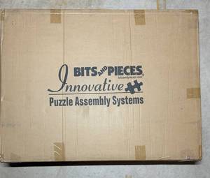 lot 220C image: LL - Bits and Pieces Puzzle Assembly System in Original Packaging