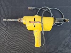 lot 33 image: McGraw-Edison Shopmate 12 Inch Reversible Electric Drill Model 2242T0