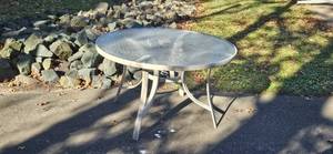 lot 52 image: Coleman 49 Inch Round Outdoor Patio Table with Glass Top