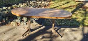 lot 53 image: Large Oval Wood Dining Table with Metal Base 72x42x28 Inches