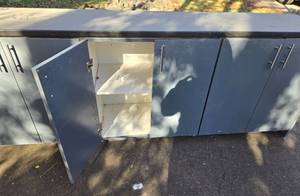 lot 57 image: Large 96-Inch Office Storage Cabinet with Multiple Doors and Shelves