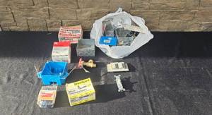 lot 83 image: Assorted Electrical Junction Boxes, Outlets, Wire Connectors, and Hardware Lot