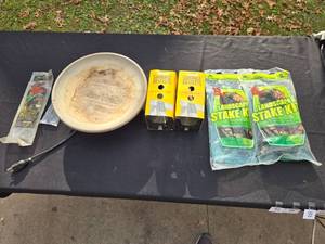 lot 97 image: Assorted Workshop Hardware Lot with Shims, Stakes, Sawhorse Brackets, and Heated Bird Bath