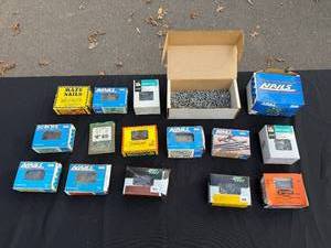 lot 105 image: Collection of Nails, Screws, and Staples Assorted Hardware Boxes - quantities unverified in open boxes