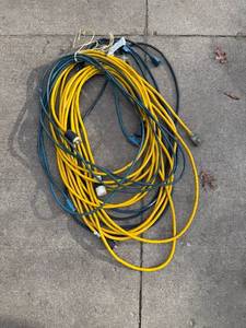 lot 110 image: Assorted Heavy Duty Extension Cords Yellow and Green