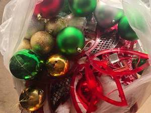 lot 113 image: Holiday Decor Lot with Ornaments, Santa Hats, Gnome, and Skeleton Chicken