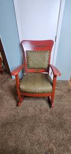 lot 122 image: Antique Wooden Rocking Chair with Upholstered Seat and Decorative Back