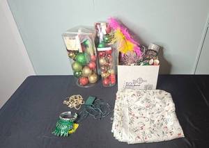 lot 144 image: Holiday and New Years Assortment Including Ornaments, Decor, Hats, and Party Supplies
