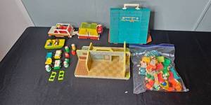 lot 148 image: Vintage Fisher-Price Play Family A-Frame House, Figures, and Accessories Lot