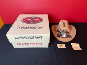 lot 215 image: BEAUTIFUL Charlie 1 Horse Longhorn Genuine Fur Felt Western Hat with Feather Accent, Size 6 58