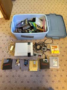 lot 261 image: Nintendo Entertainment System Console with Controllers, Power Supply, and Game Collection