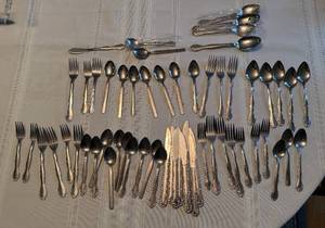 lot 267 image: Large Set of Ornate Silverware Flatware Including Knives, Forks, and Spoons