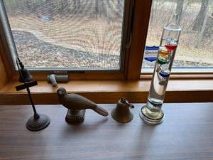lot 276 image: Collection of Vintage Metal Bells, Cast Iron Bird, and Galileo Thermometer