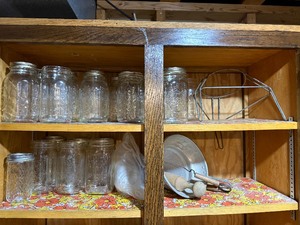 lot 257 image: Collection of Vintage Mason Jars and Metal Strainer with Kitchen Utensils