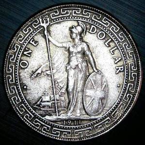 lot 8 image: 1911 B British India Trade Dollar UNAUTHENTICATED Coin