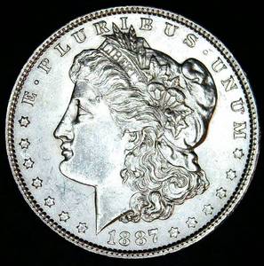lot 71 image: AUBU 1887 Morgan Silver Dollar