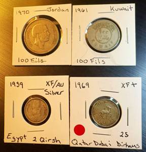 lot 74 image: (4) Tougher Find World Coins, 50 Years Old, one is silver