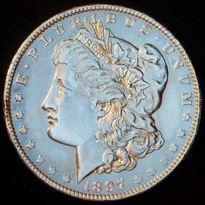 lot 76 image: AU 1897 O Morgan Silver Dollar, cleaned