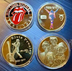 lot 82 image: Set of (4) gold plated Legends of Rock n Roll Medallions