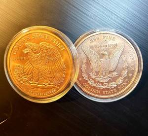 lot 78 image: (2) 5 oz Copper Rounds