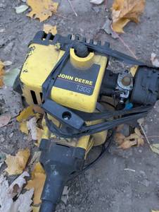 lot 12 image: Vintage John Deere Weed Whip