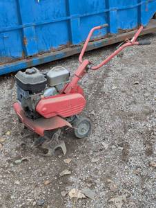 lot 30 image: Large yard Machine Tiller - Red