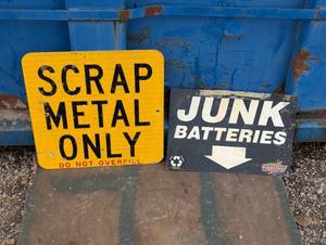 lot 45 image: 2 Signs - Metal Scrap Metal Sign and Plastic Junk Batteries Sign