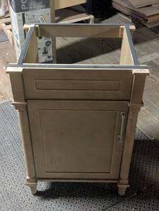 lot 20 image: Aberdeen 24 in. Single Sink Antique Oak Bath Vanity with Carrara Marble Top - Cracked Top - Removable