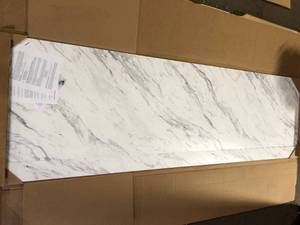 lot 26 image: THINSCAPE 8 ft. L x 25 in. D Engineered Composite Countertop in Calcutta Blanc with Satin Finish  Customer Returns See Pictures