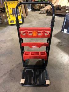 lot 30 image: Milwaukee PACKOUT 20 in. 2-Wheel Utility Cart  Customer Returns See Pictures