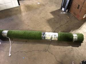 lot 37 image: TrafficMaster Landscape Turf 7.5 ft. x 10 ft. Green Artificial Grass Rug Customer Returns See Pictures