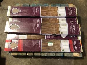 lot 49 image: 5 Boxes of Home Decorators Collection Wayne Canyon Oak 12 MIL x 7 in. W x 48 in. L Waterproof Click Lock Luxury Vinyl Plank Flooring (23.8 sq. ft. Case) Customer Returns See Pictures