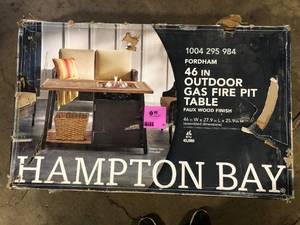 lot 50 image: Hampton Bay Fordham 46 in. W 45000 Btu Brown Steel Propane Outdoor Fire Pit Table with Lava Rocks Customer Returns See Pictures