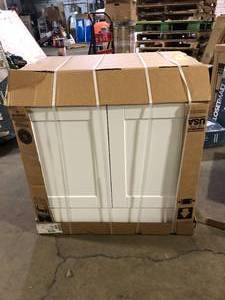 lot 57 image: Hampton Bay Shaker 33 in. W x 24 in. D x 34.5 in. H Assembled Sink Base Cabinet in Satin White  Customer Returns See Pictures