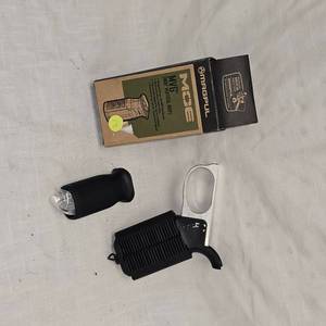 lot 63 image: Magpul AR15 Grips and Clay Throwers