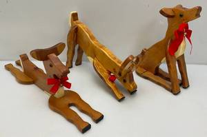 lot 23 image: Three Handmade Wooden Reindeer Door Stops