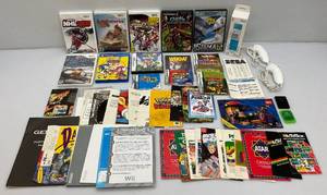 lot 29 image: Misc. Vintage Video Games, Pamplets And More (Super Mario DS Missing Game)