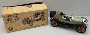 lot 55 image: Jim Beam Collectible Stutz Bear Cat Car Decanter (Windshield Broke In half)