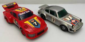 lot 92 image: Vintage 1980s Porsche Friction Car Works And Transistor Radio Porsche Needs New Battery Hook Up