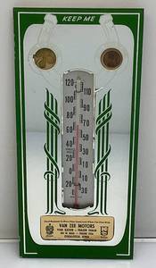 lot 97 image: Vintage Van Zee Motors Advertisement Mirrored Thermometer With Four Leaf Clover And Lucky Penny 5 12 x 12