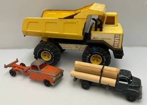 lot 116 image: Vintage Hubley And Stucto Logging Trucks And Tonka Dump Truck