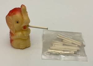 lot 124 image: SUPER RARE 1st One We have Seen Miniature Celluliod Smoking Elephant With Miniature Cigarettes That Burn 1 34 Tall
