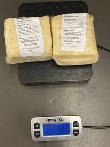 lot 54 image: F2 - 2 Blocks of Onion Jack Cheese, Total Weight 2.20 lbs, Best By 052926