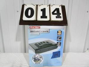 lot 14 image: First Alert Portable Security Safe - model #5200DF