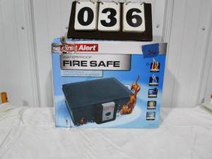 lot 36 image: First Alert Personal WaterFireproof Security Safe - Model #2017F